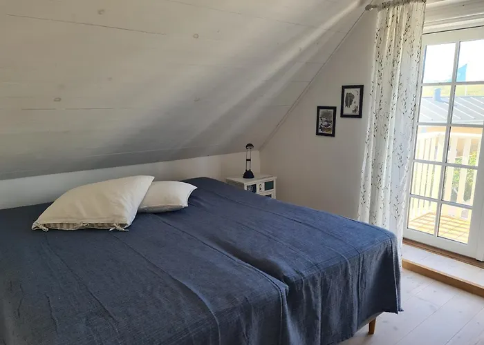 Nyaraló Strandhuset *